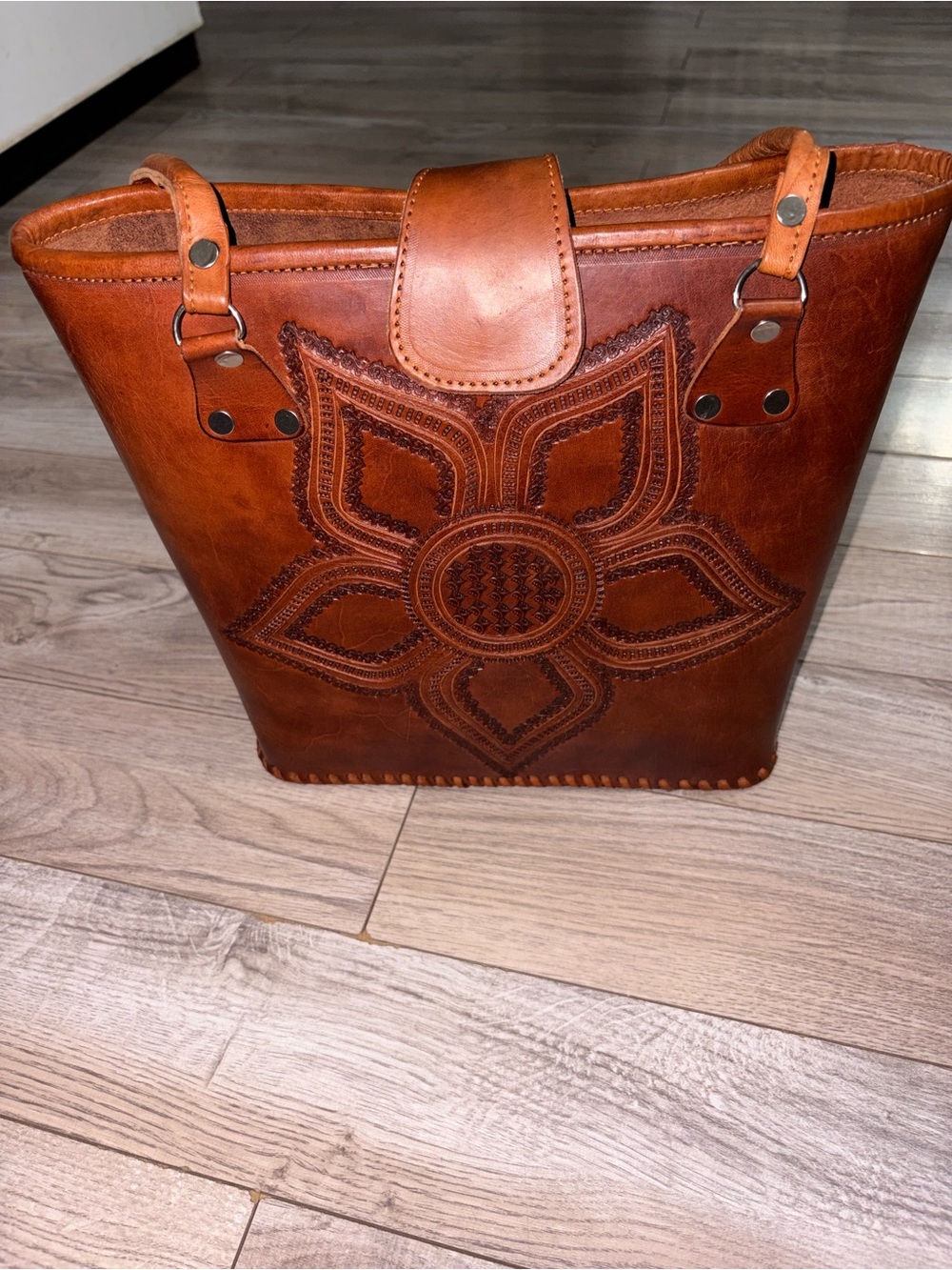 Handcrafted Brown Leather Shoulder Bag with Floral Tooled Design